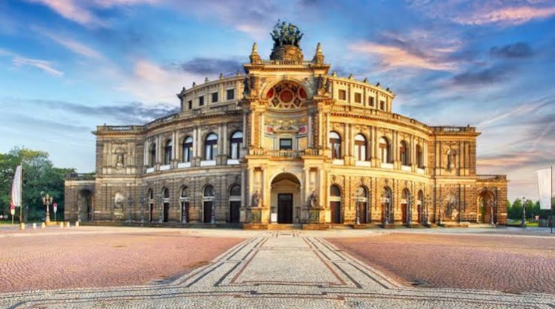 Semperoper opera house facade lit up at night